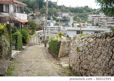 Beautiful cobblestone road in Kinjo Town, Naha City 86832995