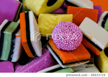 Den Helder, Netherlands. January 2022. Different kinds of english licorice in different colors. Den Helder, Netherlands. January 2022. Different kinds of english licorice in different colors. 86833728