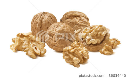 Walnut nuts isolated on white background. Whole and shelled 86834440