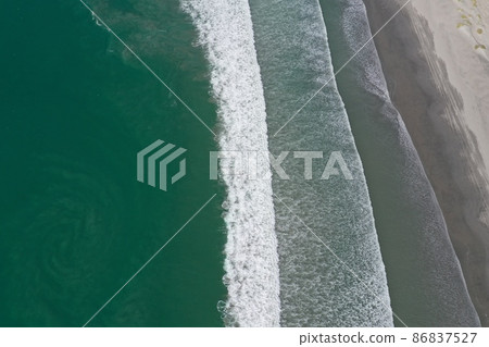 pacific ocean waves in Scorpion Bay San Juanico Baja California Sur Mexico aerial panorama landscape 86837527