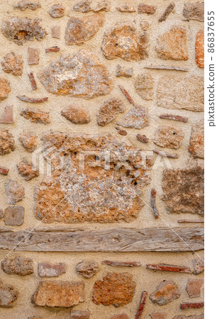 background, texture - rough masonry from wild stone and cement on a wooden frame background, texture - rough masonry from wild stone and cement on a wooden frame 86837655