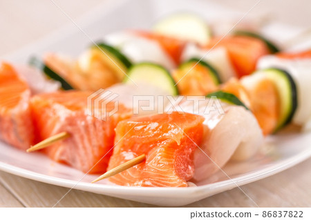 Raw Fish skewers on a Plate. High quality photo 86837822