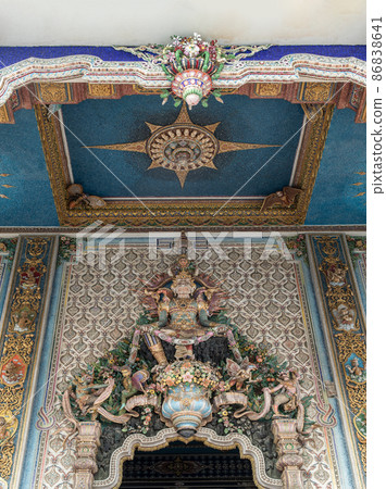 Elaborate sculptures entrance the Buddhist church at the famous of The Pariwas temple. 86838641