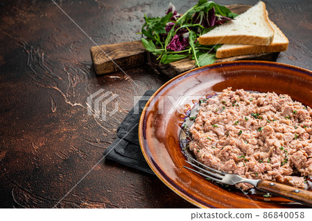 Tuna canned fish with bread and salad. Dark background. top view. Copy space Tuna canned fish with bread and salad. Dark background. top view. Copy space 86840058