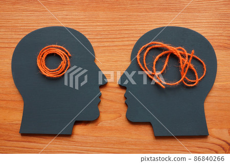 Problem solving skills concept. Figures of heads and coiled rope. Problem solving skills concept. Figures of heads and coiled rope. 86840266