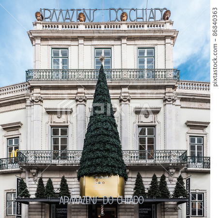 Lisbon, Portugal - 12 28 2018: decorated white facade with christmas tree 86840363