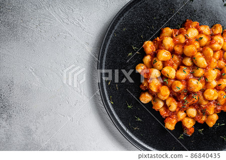 Gnocchi potato pasta with tomato sauce. White background. Top view. Copy space Gnocchi potato pasta with tomato sauce. White background. Top view. Copy space 86840435