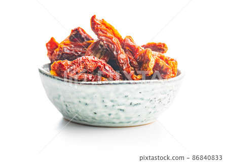 Sun dried tomatoes in bowl. Sun dried tomatoes in bowl. 86840833