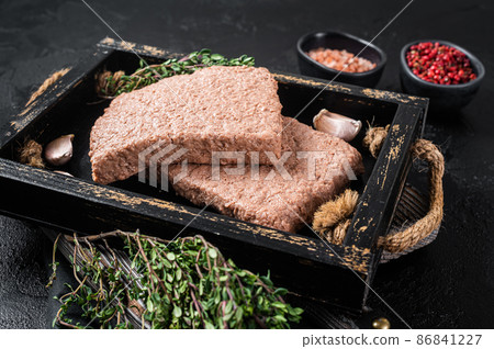 Raw plant based vegan mince meat with herbs. Black background. Top view 86841227