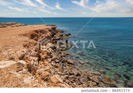 Ayia Napa rocky coastlane, Cyprus. 86841573