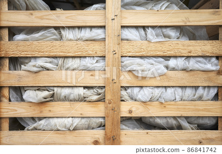 Agrotextile in a wooden box. Agrotextile in a wooden box. 86841742