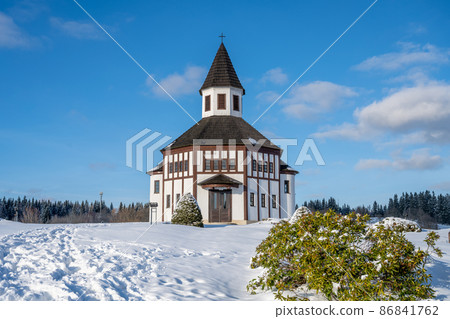 Wooden evangelic chapel in Tesarov in wintertime 86841762