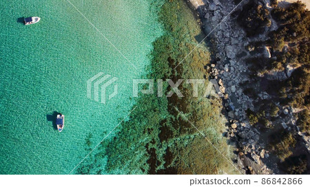 Aerial drone view of the rocky coast and the Mediterranean Sea near the scenic Aphrodite Trail in the Akamas Peninsula National Park, Cyprus. 86842866
