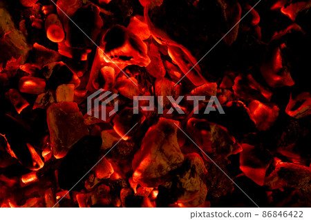 Glowing embers in hot red color, abstract background. The hot embers of burning wood log fire. Firewood burning on grill. Texture fire bonfire embers Glowing embers in hot red color, abstract background. The hot embers of burning wood log fire. Firewood burning on grill. Texture fire bonfire embers 86846422