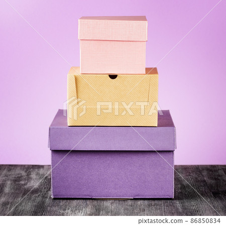 Colorful package box on a table 86850834