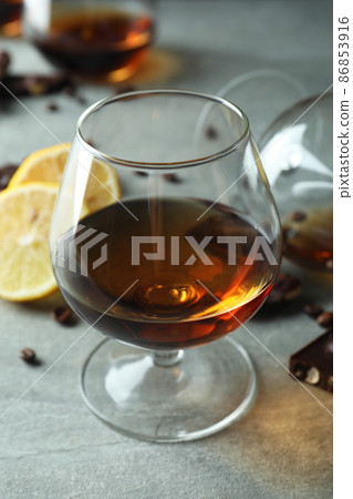 Concept of hard alcoholic drinks with cognac Concept of hard alcoholic drinks with cognac 86853916