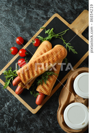 Concept of tasty food with french hot dog Concept of tasty food with french hot dog 86854219