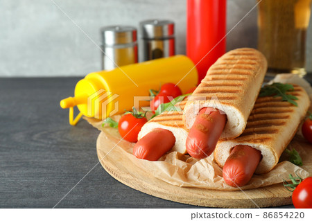 Concept of tasty food with french hot dog Concept of tasty food with french hot dog 86854220