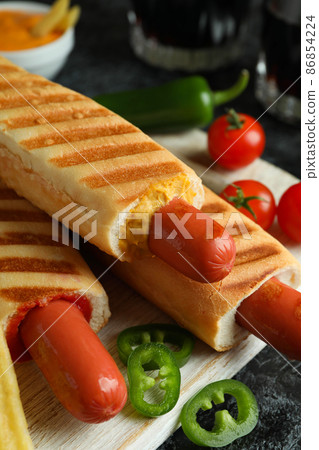 Concept of tasty food with french hot dog Concept of tasty food with french hot dog 86854224