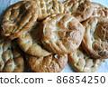 Abundant Ramadan Pita. Turkish pide bread with sesame is a traditional no knead flatbread. Ramadan Pita, Pide, traditional Turkish bread for Mubarak month of Ramadan or Ramanzan.  86854250