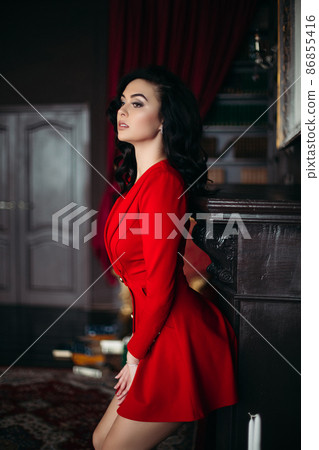 Sexy brunette woman wearing in red seductive Sexy brunette woman wearing in red seductive 86855416