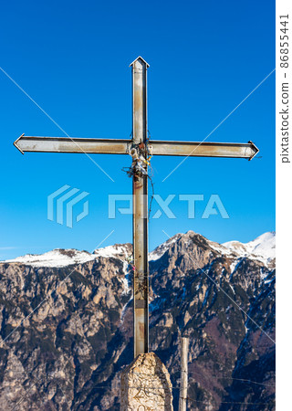 Metal Religious Cross on a Mountain Peak - Lessinia Plateau Veneto Italy 86855441