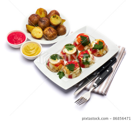 Portion of delicious chicken aspic on a plate isolated on white background 86856471