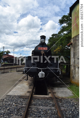 Scenery with a steam locomotive Scenery with a steam locomotive 86857764