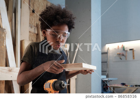 Cute Black Boy in Workshop Cute Black Boy in Workshop 86858316