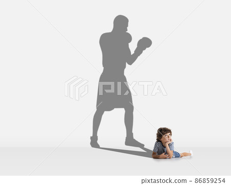 Little child, baby boy lying and dreaming of becoming professional boxer Little child, baby boy lying and dreaming of becoming professional boxer 86859254