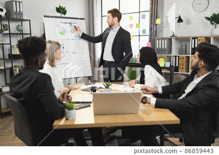 Financier having meeting with diverse company workerks Financier having meeting with diverse company workerks 86859443