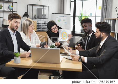 Business people having video call on laptop at office 86859467