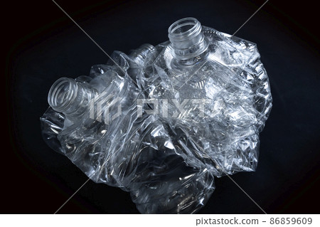 Crushed PET bottles for recycling Crushed PET bottles for recycling 86859609