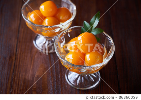 Kumquats in Syrup Kumquats in Syrup 86860059