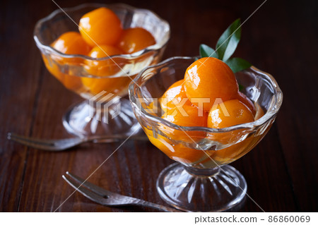 Kumquats in Syrup Kumquats in Syrup 86860069