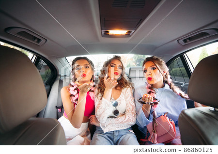 Fashionable Best girlfriends go in the car, enjoy 86860125