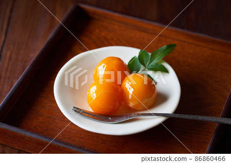 Kumquats in Syrup Kumquats in Syrup 86860466