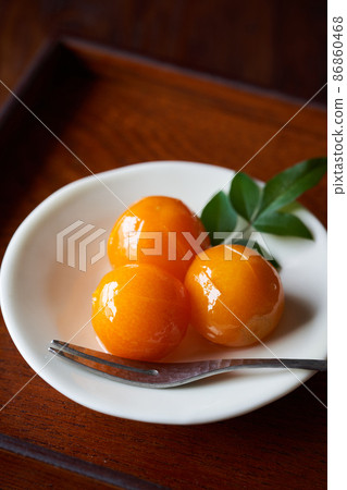 Kumquats in Syrup Kumquats in Syrup 86860468