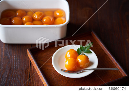 Kumquats in Syrup Kumquats in Syrup 86860474