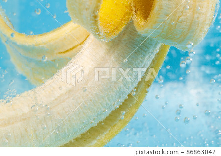 Banana fruit under water, selective focus, macro. Healthy lifestyle. Multivitamin cocktail. Summer diet 86863042