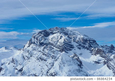 Piz Ela, a famous peak in Grisons, Switzerland, seen from Mount Darlux during winter conditions Piz Ela, a famous peak in Grisons, Switzerland, seen from Mount Darlux during winter conditions 86864234