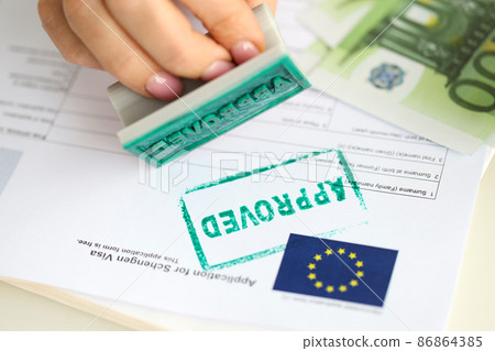 Stamp approved on a document for a visa to Europe 86864385