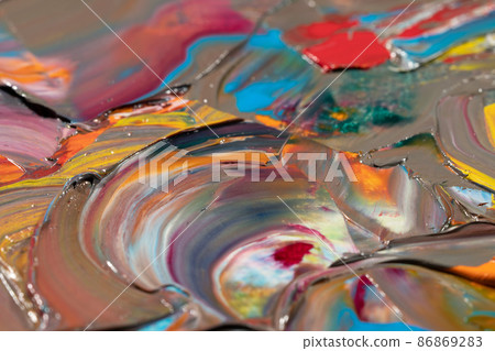 Mixed oil paints close-up. Colorful abstract background 86869283