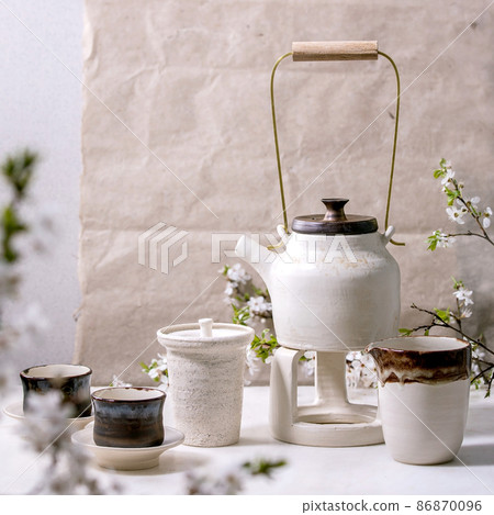 White and black handmade ceramic teapot for tea ceremony White and black handmade ceramic teapot for tea ceremony 86870096