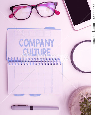Conceptual display Company Culture. Business overview The environment and elements in which employees work Office Supplies Over Desk With Keyboard And Glasses And Coffee Cup For Working Conceptual display Company Culture. Business overview The environment and elements in which employees work Office Supplies Over Desk With Keyboard And Glasses And Coffee Cup For Working 86874862