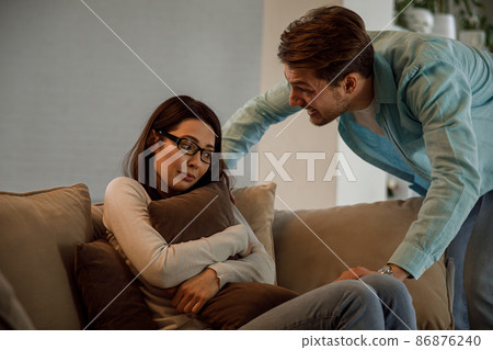 Young couple having argument-conflict, bad relationships. Angry men yells at a woman. 86876240
