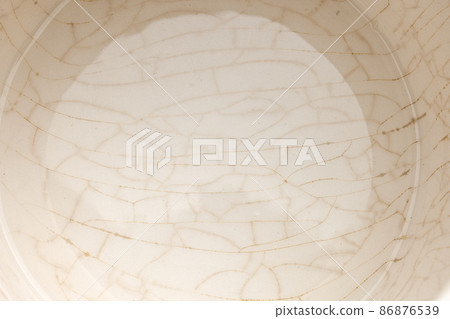 cracked glaze on the bottom of a white ceramic cup cracked glaze on the bottom of a white ceramic cup 86876539