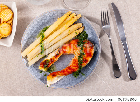 Fresh salmon steak with bunch of roasted asparagus 86876806