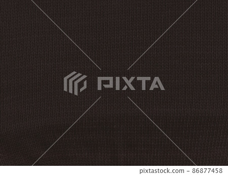 Warm black sweater made of wool. Black fabric background. Warm black sweater made of wool. Black fabric background. 86877458