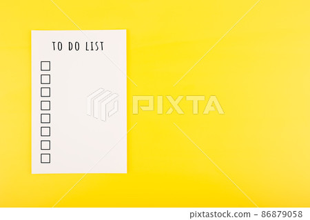 To do list concept in bright yellow color with copy space To do list concept in bright yellow color with copy space 86879058